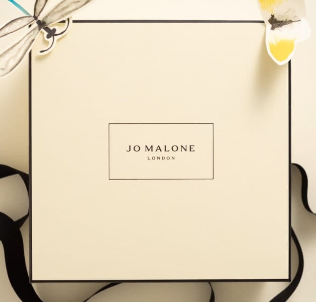 Birthday Cakes and Jo Malone London Boxes on cake stands 